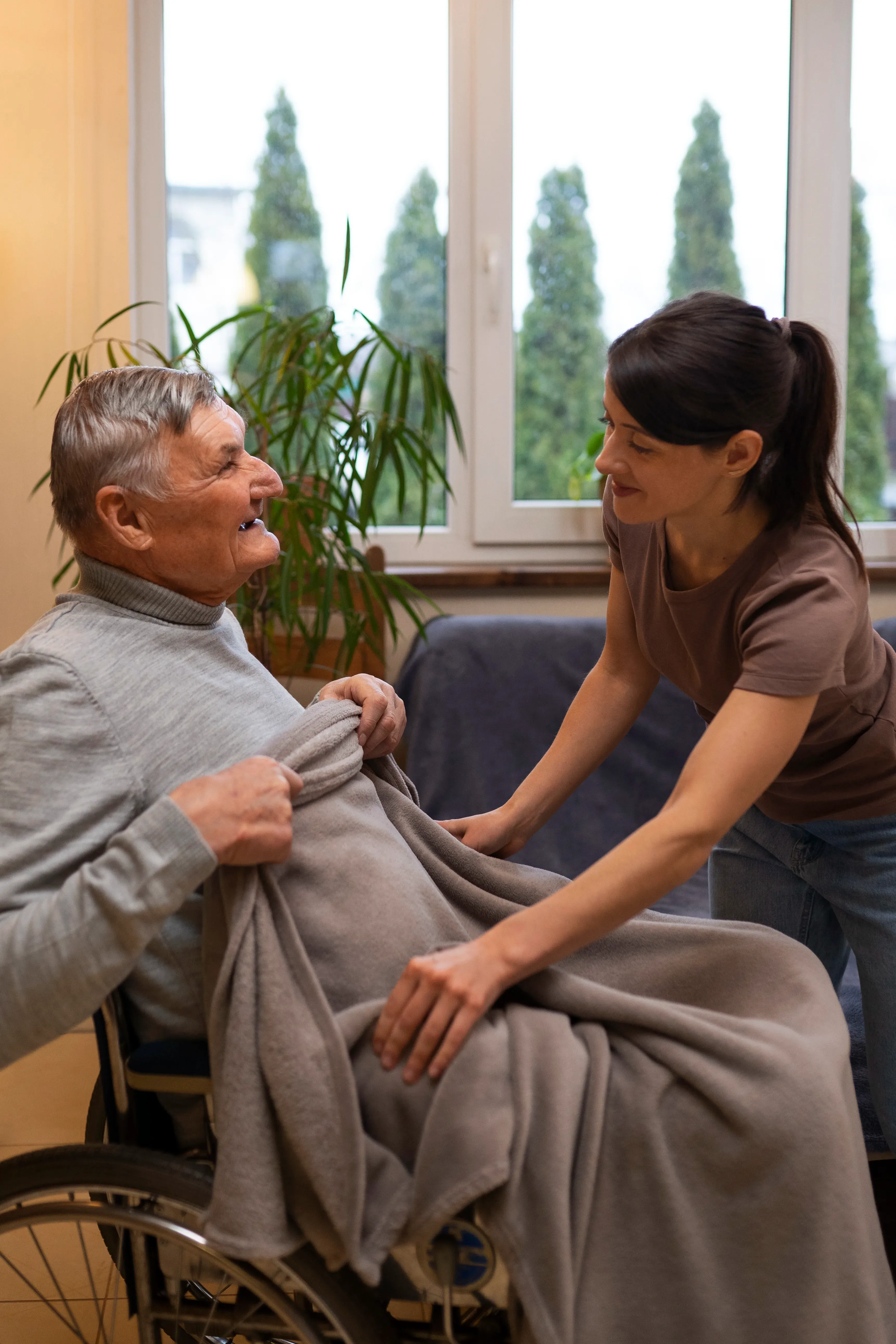 Care professional helping with personal care at home